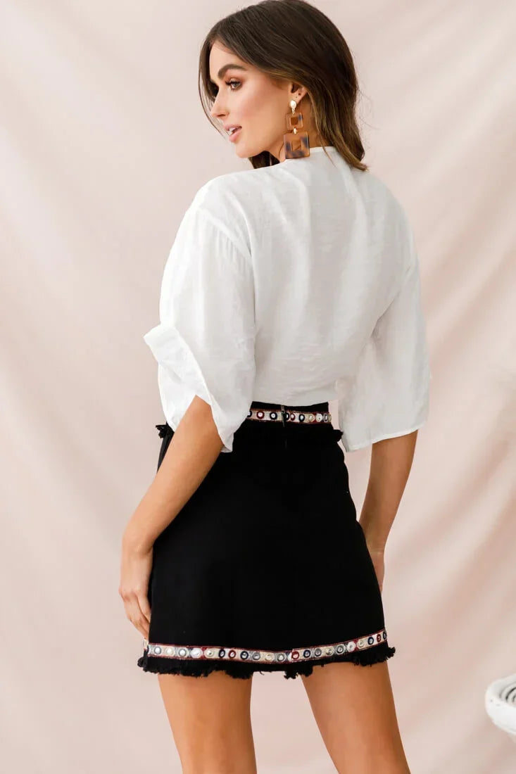 Black Mini Skirt with Embroidered Tribal Panel and Fringe Hem